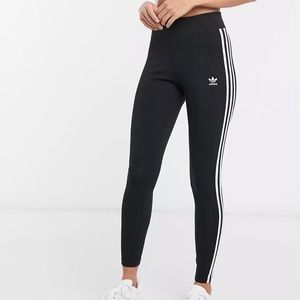 Black adidas leggings w/ signature stripes.
